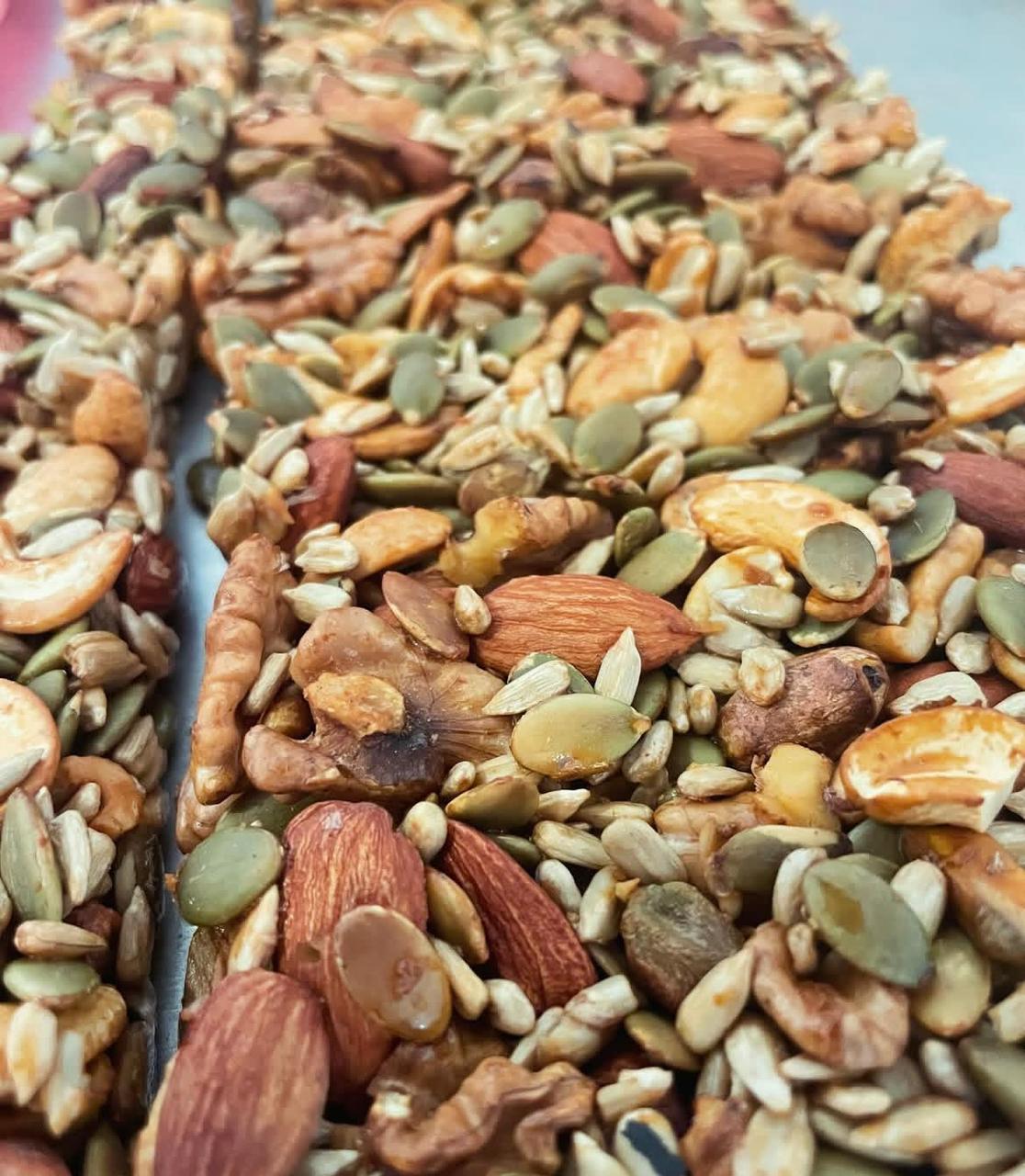 Jars of seed mixes on a counter